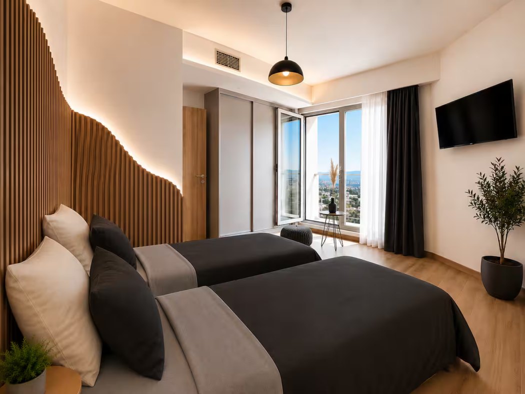 Bedroom 1 with two single beds and warm bedding